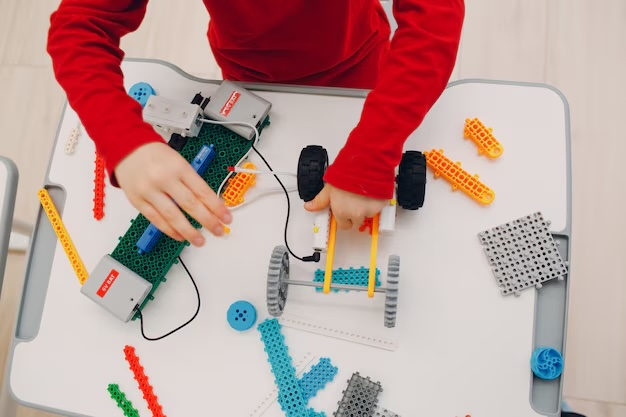 Child building a robot